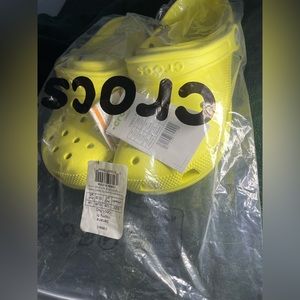 Brand new womens size 7 crocs yellow- greenish color